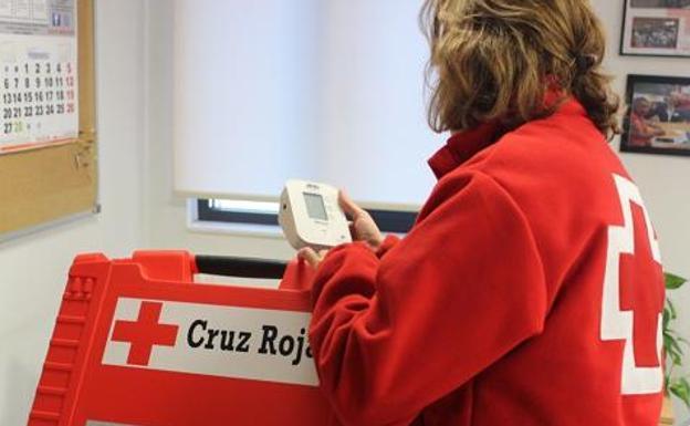 Voluntaria de la Cruz Roja./